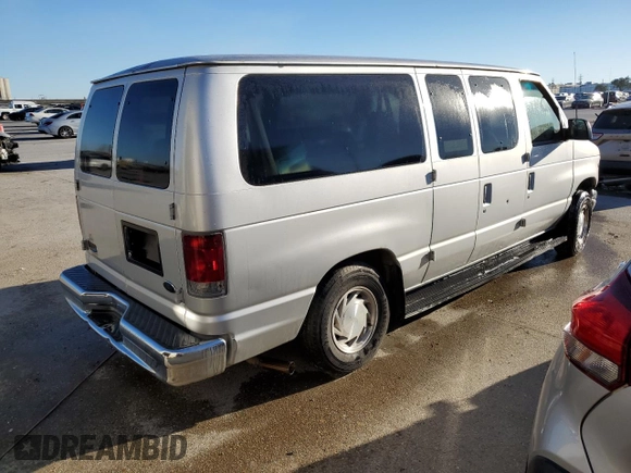 2002 Ford Econoline Passenger XL with VIN 1FMRE11LX2HB04681, listed as a Copart auction lot 60885454 with 114,665 mi miles and Salvage title. Bid and sale history available at DreamBid. Image 3.