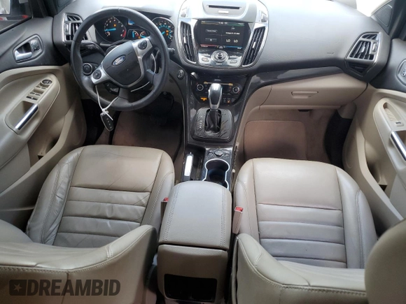 2015 Ford Escape Titanium z VIN 1FMCU9J90FUC41606, wystawiony jako Copart lot #57458455 z przebiegiem 71 671 mil mil oraz Szkoda całkowita • Salvage title. Historia ofert i sprzedaży dostępna na DreamBid. Obrazek 8.