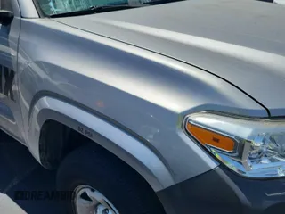 2019 Toyota Tacoma SR with VIN 5TFRX5GN1KX143485, listed as a IAAI auction lot 42763045 with 90,847 mi miles and . Bid and sale history available at DreamBid. Image 1.
