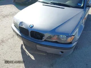 2004 BMW 3 Series 325i with VIN WBAET37414NJ84667, listed as a IAAI auction lot 41723669 with 160,384 mi miles. Bid and sale history available at carsss.com. Image 6.