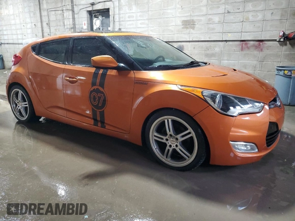 2012 Hyundai Veloster w/Gray Int z VIN KMHTC6AD4CU023265, wystawiony jako Copart lot #54959585 z przebiegiem 130 115 mil mil oraz Czysty tytuł • Clean title. Historia ofert i sprzedaży dostępna na DreamBid. Obrazek 4.