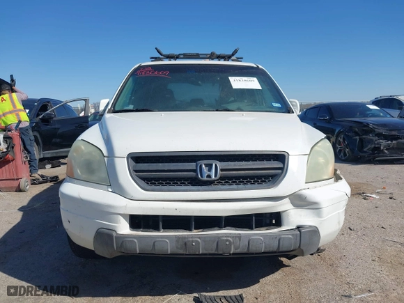 2005 Honda Pilot EX-L with NAVI with VIN 2HKYF18775H571312, listed as a IAAI auction lot 41830609 with 297,923 mi miles. Bid and sale history available at carsss.com. Image 12.