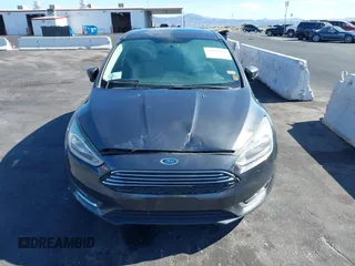 2017 Ford Focus Titanium with VIN 1FADP3N25HL299817, listed as a IAAI auction lot 42161440 with 154,974 mi miles and . Bid and sale history available at carsss.com. Image 12.