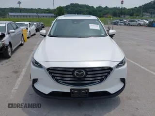 2019 Mazda CX-9 Touring with VIN JM3TCACY1K0334804, listed as a IAAI auction lot 42411662 with 49,447 mi miles and . Bid and sale history available at DreamBid. Image 12.