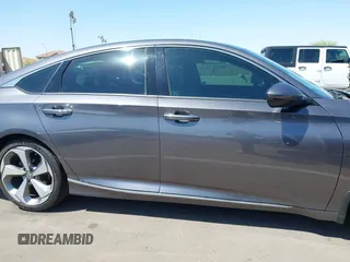 2019 Honda Accord Touring with VIN 1HGCV2F92KA004825, listed as a IAAI auction lot 41974555 with 74,464 mi miles and . Bid and sale history available at DreamBid. Image 13.