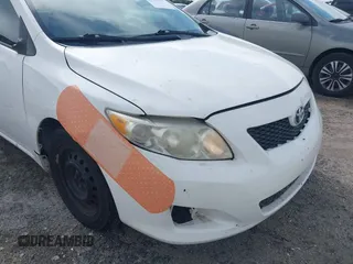 2010 Toyota Corolla with VIN 2T1BU4EE5AC529444, listed as a IAAI auction lot 41914171 with 185,398 mi miles. Bid and sale history available at carsss.com. Image 6.