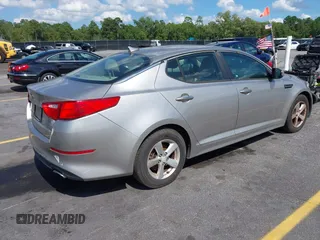 2015 Kia Optima LX with VIN 5XXGM4A79FG477619, listed as a IAAI auction lot 42561432 with 125,274 mi miles and . Bid and sale history available at DreamBid. Image 4.