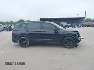 2023 Volkswagen Tiguan SE R-Line Black with VIN 3VVCB7AX1PM106543, listed as a IAAI auction lot 41784559 with 39,846 mi miles and . Bid and sale history available at DreamBid. Image 14.