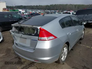 2010 Honda Insight EX with VIN JHMZE2H77AS022538, listed as a IAAI auction lot 41804579 with 184,000 mi miles and . Bid and sale history available at DreamBid. Image 3.