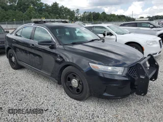 2014 Ford Police Interceptor with VIN 1FAHP2L82EG105333, listed as a Copart auction lot 66361525 with 101,176 mi miles and Clean title. Bid and sale history available at DreamBid. Image 4.