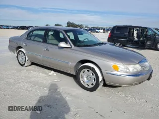 1999 Lincoln Continental with VIN 1LNHM97V8XY671775, listed as a Copart auction lot 42429965 with 79,851 mi miles and Clean Title. Bid and sale history available at carsss.com. Image 4.