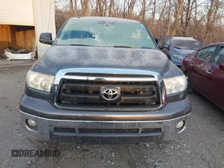 2012 Toyota Tundra 4WD Truck with VIN 5TFDW5F11CX250999, listed as a IAAI auction lot 41087695 with 244,868 mi miles. Bid and sale history available at carsss.com. Image 12.