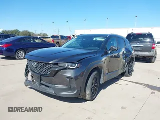 2023 Mazda CX-50 S Select with VIN 7MMVABAM5PN150568, listed as a IAAI auction lot 41464996 with 62,612 mi miles and . Bid and sale history available at DreamBid. Image 2.