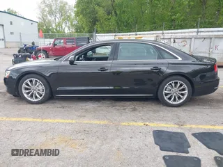 2013 Audi A8 3.0L с VIN WAURGAFD8DN012938, выставлен на аукционе IAAI как лот 42334901 с пробегом 64 235 миль миль и . История ставок и продаж доступна на DreamBid. Изображение 14.