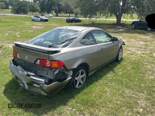 2003 Acura RSX z VIN JH4DC54873S002163, wystawiony jako Copart lot #51872605 z przebiegiem Nie podano mil oraz Szkoda całkowita • Salvage title. Historia ofert i sprzedaży dostępna na DreamBid. Obrazek 4.