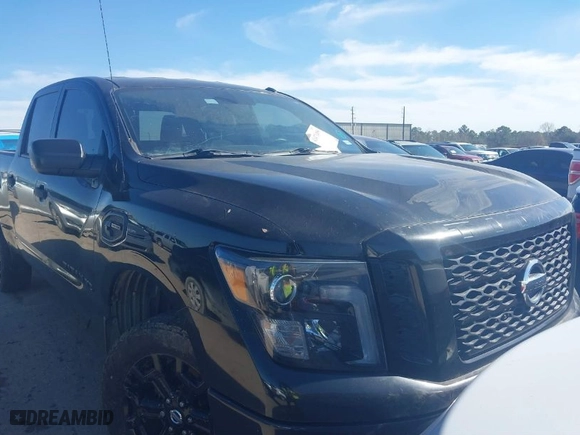 2018 Nissan Titan XD Platinum Reserve with VIN 1N6BA1F44JN522847, listed as a IAAI auction lot 41471499 with 119,124 mi miles. Bid and sale history available at carsss.com. Image 1.