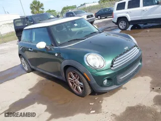 2013 MINI Cooper Hardtop with VIN WMWSU3C59DT688362, listed as a IAAI auction lot 42088778 with 102,301 mi miles. Bid and sale history available at carsss.com. Image 1.