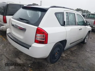 2007 Jeep Compass Sport with VIN 1J8FT47W27D256252, listed as a IAAI auction lot 41616554 with 210,125 mi miles. Bid and sale history available at carsss.com. Image 4.