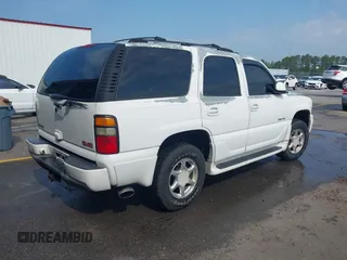2004 GMC Yukon Denali z VIN 1GKEK63U84J118819, wystawiony jako IAAI lot #42273266 z przebiegiem 217 506 mil mil oraz . Historia ofert i sprzedaży dostępna na DreamBid. Obrazek 4.
