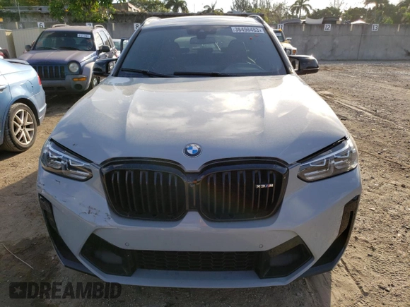 2022 BMW X3 M z VIN 5YM13EC01N9L57914, wystawiony jako Copart lot #38498483 z przebiegiem 17 261 mil mil oraz Szkoda całkowita • Salvage title. Historia ofert i sprzedaży dostępna na DreamBid. Obrazek 5.