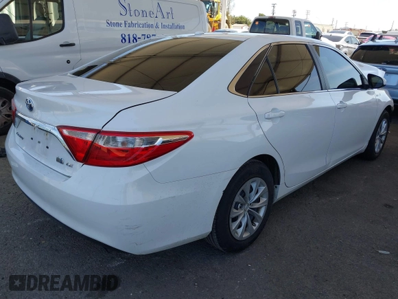 2017 Toyota Camry Hybrid LE with VIN 4T1BD1FKXHU206891, listed as a IAAI auction lot 41839609 with 142,744 mi miles. Bid and sale history available at carsss.com. Image 4.