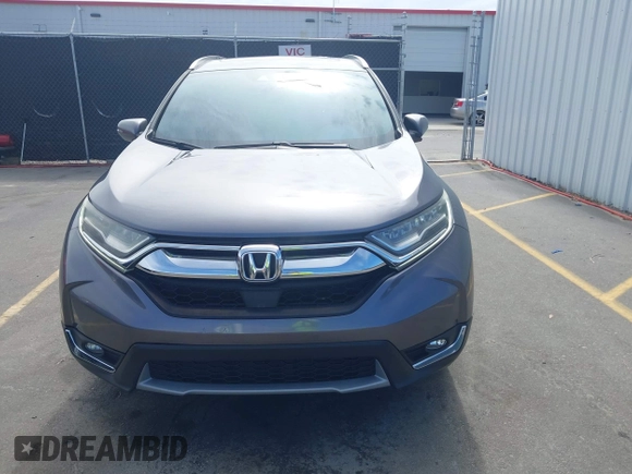 2018 Honda CR-V Touring with VIN 7FARW1H9XJE018575, listed as a IAAI auction lot 41747192 with 83,699 mi miles and . Bid and sale history available at carsss.com. Image 12.