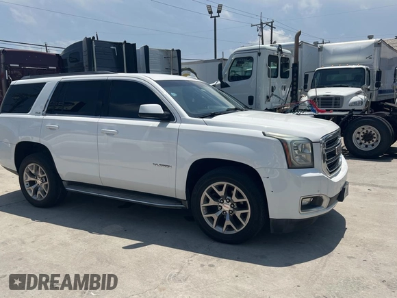 2015 GMC Yukon SLE with VIN 1GKS1AKCXFR513784, listed as a Copart auction lot 54203395 with 219,112 mi miles and Clean Title. Bid and sale history available at carsss.com. Image 1.