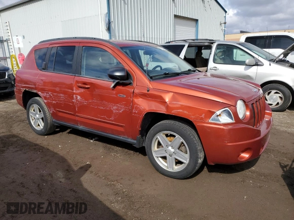 2010 Jeep Compass North Edition with VIN 1J4NF4FB0AD630982, listed as a Copart auction lot 50602465 with 233,513 mi miles and Clean Title. Bid and sale history available at carsss.com. Image 4.