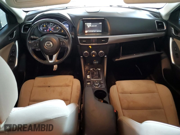 2016 Mazda CX-5 Touring with VIN JM3KE2CY7G0653854, listed as a Copart auction lot 74825564 with 139,193 mi miles and Salvage Title. Bid and sale history available at DreamBid. Image 8.