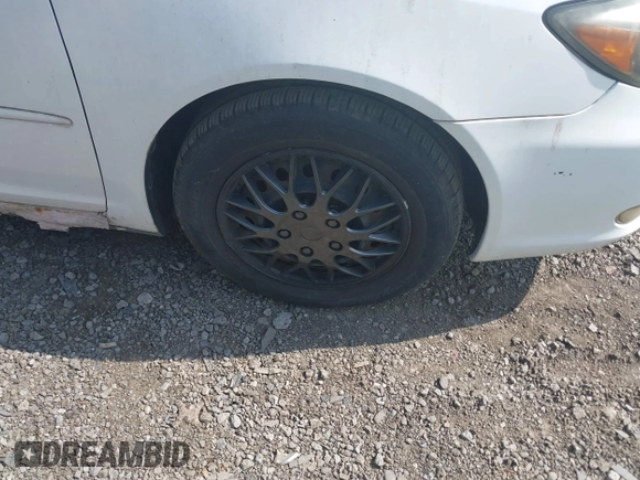 2003 Toyota Camry LE with VIN JTDBE32K830222476, listed as a IAAI auction lot 42160720 with 161,570 mi miles and . Bid and sale history available at DreamBid. Image 16.