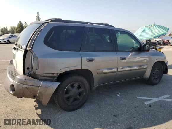 2005 GMC Envoy SLT with VIN 1GKDS13S952382088, listed as a Copart auction lot 64765154 with 177,333 mi miles and Salvage Title. Bid and sale history available at carsss.com. Image 3.