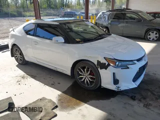 2014 Scion tC with VIN JTKJF5C7XE3073478, listed as a IAAI auction lot 42058385 with 151,491 mi miles. Bid and sale history available at carsss.com. Image 1.
