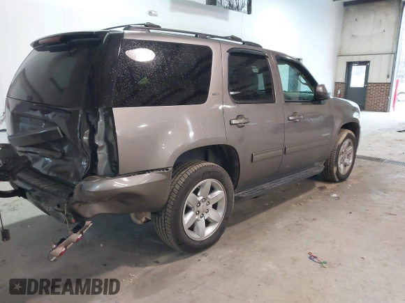 2011 GMC Yukon SLT with VIN 1GKS2CE07BR213141, listed as a IAAI auction lot 41674842 with 226,151 mi miles. Bid and sale history available at carsss.com. Image 4.