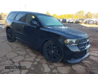 2013 Dodge Durango R/T with VIN 1C4SDHCT5DC558951, listed as a IAAI auction lot 41590515 with 150,985 mi miles and . Bid and sale history available at DreamBid. Image 1.