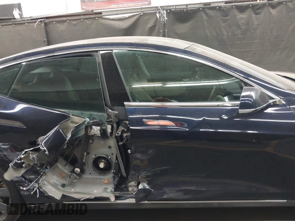 2014 Tesla Model S 60 with VIN 5YJSA1H11EFP56406, listed as a IAAI auction lot 42065157 with Not Provided miles and . Bid and sale history available at DreamBid. Image 13.