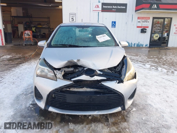 2015 Toyota Yaris L with VIN VNKJTUD36FA036518, listed as a IAAI auction lot 41233406 with 138,481 mi miles. Bid and sale history available at carsss.com. Image 12.