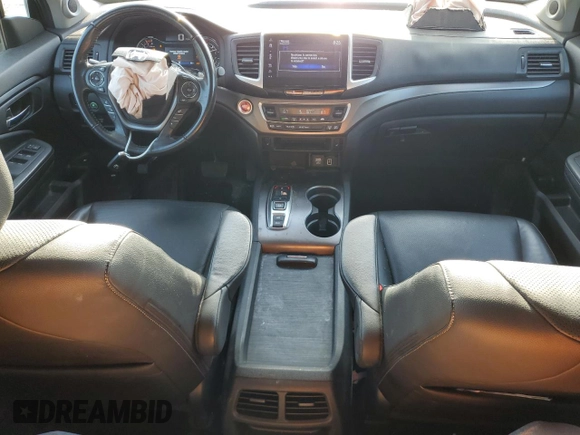 2020 Honda Ridgeline RTL with VIN 5FPYK3F58LB009883, listed as a Copart auction lot 53469475 with 145,773 mi miles and Salvage title. Bid and sale history available at DreamBid. Image 8.