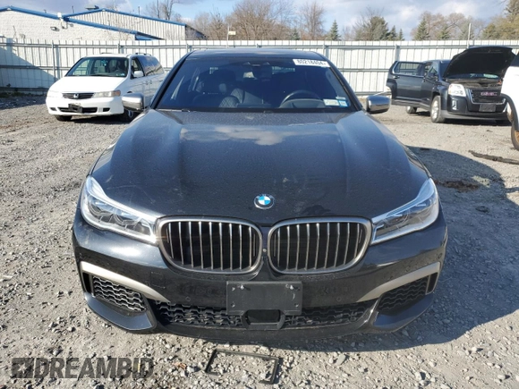 2019 BMW 7 Series M760i xDrive with VIN WBA7H6C55KG615037, listed as a Copart auction lot 80218404 with 43,405 mi miles and Salvage Title. Bid and sale history available at carsss.com. Image 5.