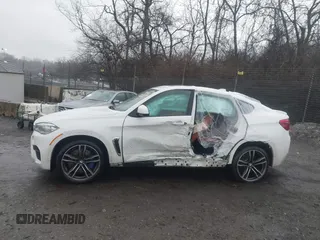 2016 BMW X6 M with VIN 5YMKW8C50G0R43150, listed as a IAAI auction lot 41463258 with 81,202 mi miles. Bid and sale history available at carsss.com. Image 14.