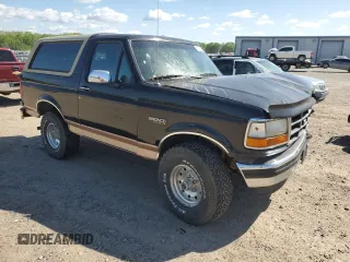 1994 Ford Bronco Custom with VIN 1FMEU15H2RLB24261, listed as a Copart auction lot 52582645 with 215,931 mi miles and Clean Title. Bid and sale history available at DreamBid. Image 4.