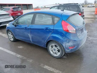 2019 Ford Fiesta SE with VIN 3FADP4EJ2KM121091, listed as a IAAI auction lot 41595764 with 98,669 mi miles. Bid and sale history available at carsss.com. Image 3.