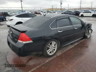 2012 Chevrolet Impala LTZ with VIN 2G1WC5E35C1317341, listed as a Copart auction lot 43404685 with 131,702 mi miles and Salvage Title. Bid and sale history available at DreamBid. Image 3.