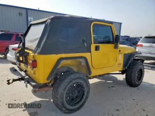 2003 Jeep Wrangler Sport with VIN 1J4FA49S43P369906, listed as a Copart auction lot 58079235 with 139,547 mi miles and Salvage title. Bid and sale history available at DreamBid. Image 3.