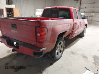 2018 Chevrolet Silverado 1500 LT with VIN 1GCVKREC0JZ217603, listed as a IAAI auction lot 41398543 with 109,503 mi miles and . Bid and sale history available at DreamBid. Image 4.