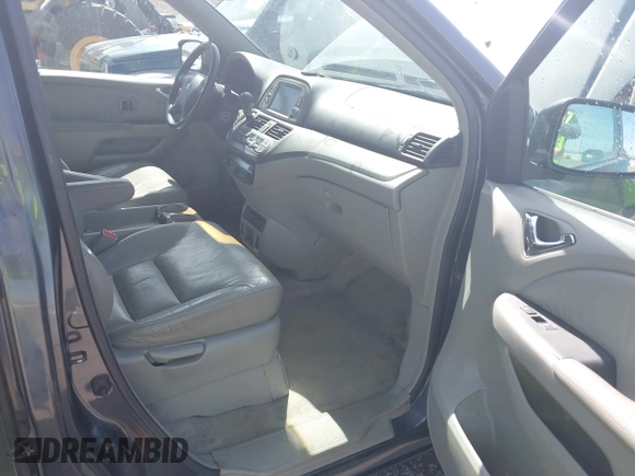 2005 Honda Odyssey TOURING with VIN 5FNRL38855B091754, listed as a IAAI auction lot 42131326 with 258,635 mi miles. Bid and sale history available at carsss.com. Image 5.