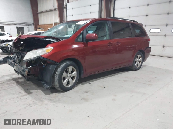 2013 Toyota Sienna LE AAS with VIN 5TDKK3DC6DS298372, listed as a IAAI auction lot 42062376 with 313,697 mi miles. Bid and sale history available at carsss.com. Image 2.