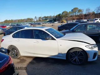 2020 BMW 3 Series M340i xDrive with VIN WBA5U9C00LFH73594, listed as a IAAI auction lot 41574837 with 46,702 mi miles and . Bid and sale history available at DreamBid. Image 13.