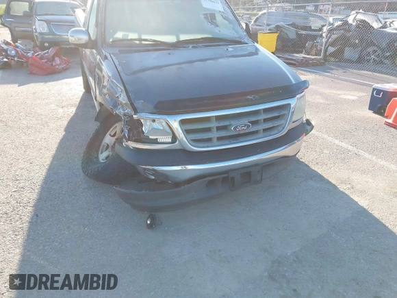 2002 Ford F-150 XL with VIN 1FTRX17L52NA85965, listed as a IAAI auction lot 41796633 with 171,814 mi miles. Bid and sale history available at carsss.com. Image 6.