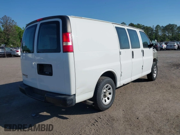 2014 Chevrolet Express Cargo Van with VIN 1GCSGAFX2E1151373, listed as a IAAI auction lot 42045528 with 123,718 mi miles. Bid and sale history available at carsss.com. Image 4.