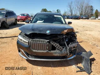 2020 BMW 7 Series 740i with VIN WBA7T2C07LCD79725, listed as a Copart auction lot 48498255 with 57,580 mi miles and Salvage title. Bid and sale history available at DreamBid. Image 5.